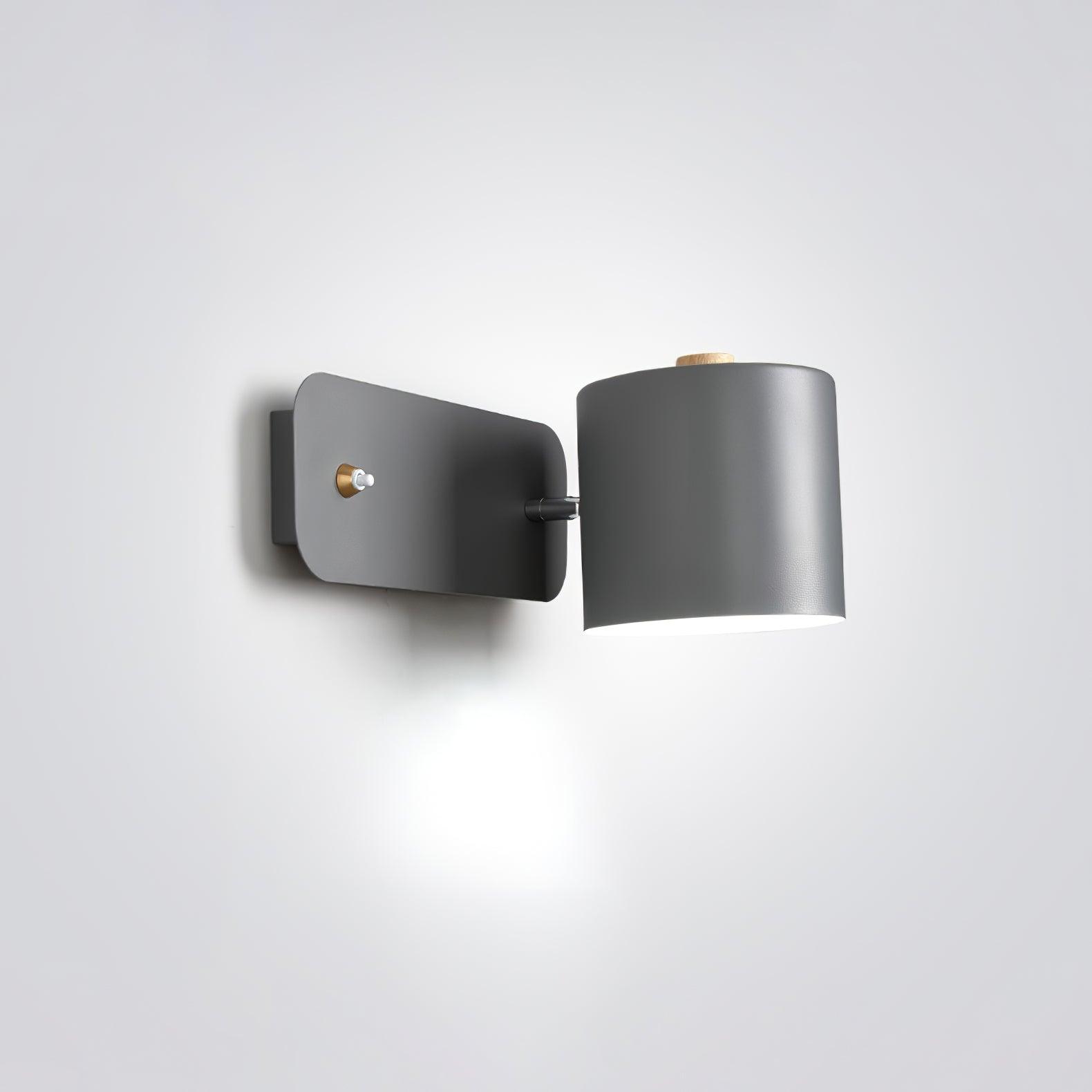 Настінний світильник з обертовим циліндром