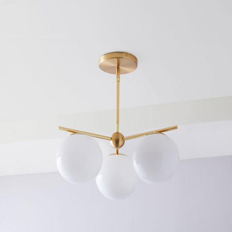 Люстра с шарами и стержнями